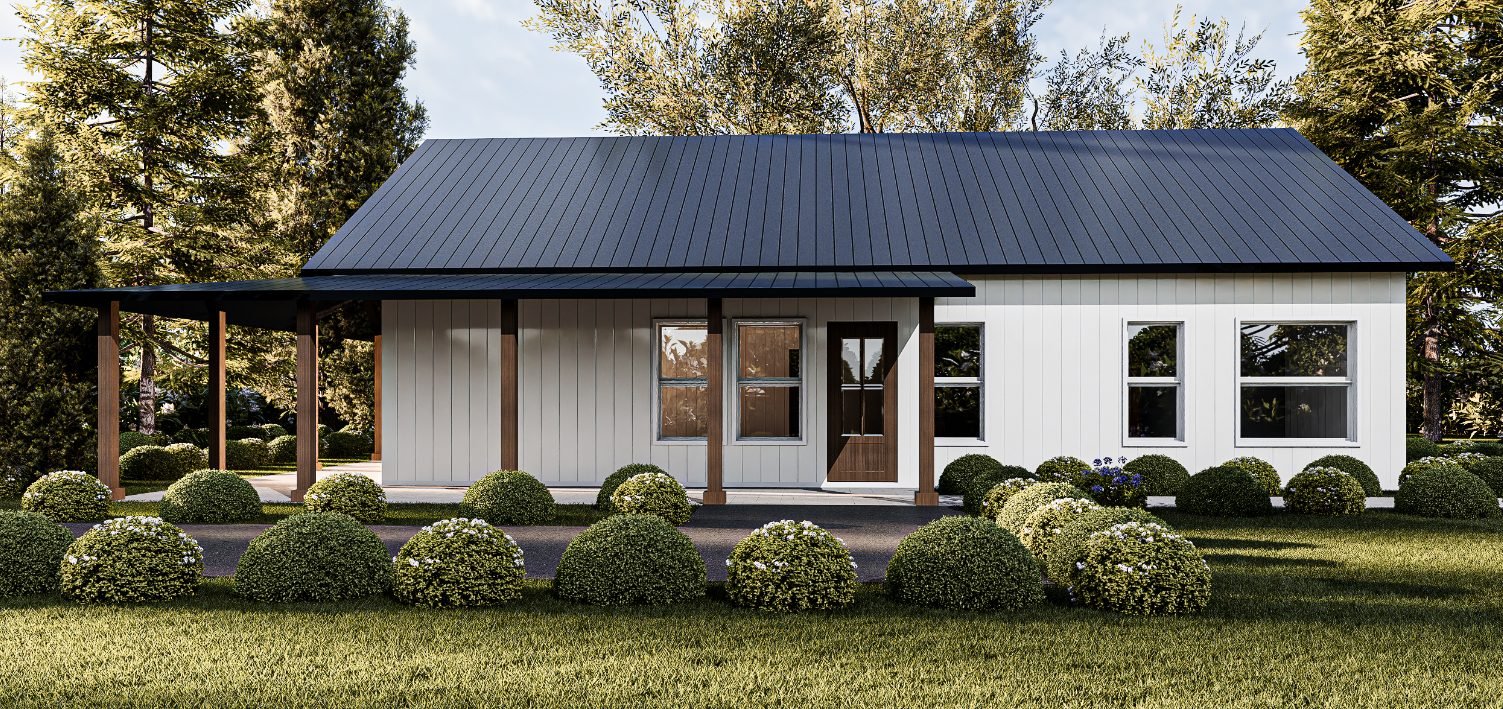 Front-facing view of a white board-and-batten barndominium with a black metal roof, covered porch, and landscaped yard